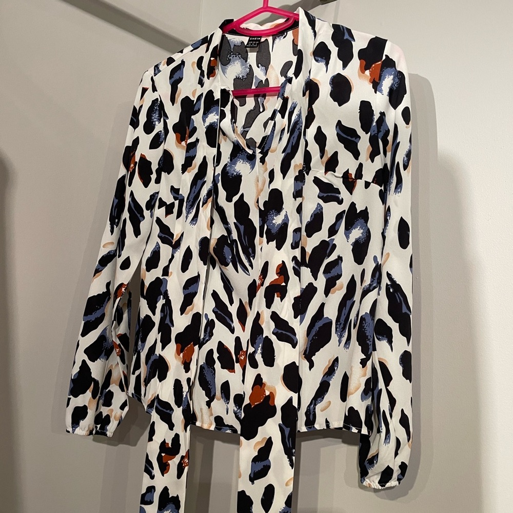 Comfy long sleeve leopard print tie blouse